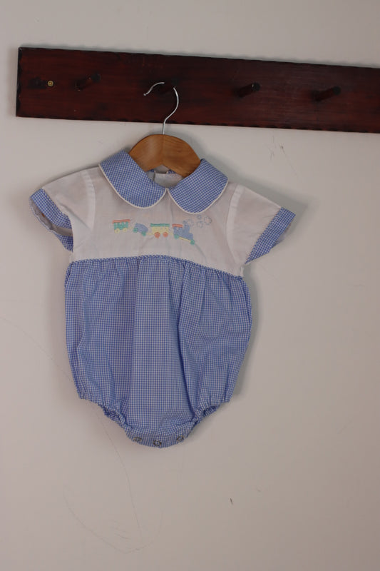 Rattles romper size 00